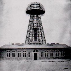 Nikola Tesla's Wardenclyfee project, 
on Long Island, New York. 
 
The metal dome, was powered with several million volts 
of resonating energy.

This was designed to be an international radio transmitter. 

The system used resonate coils. 