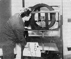 Charles Stark Draper is shown with his compass analyzer.
Click on Picture to Enlarge. 