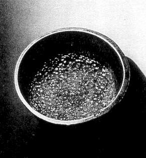 Figure 191 - Cast-Aluminum Water Cup Showing Corrosion 